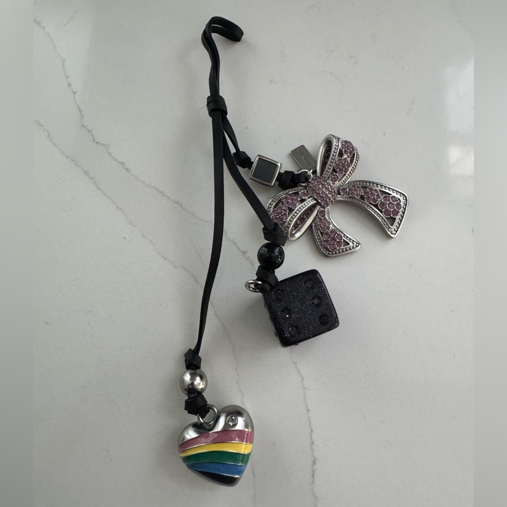 Coach Pink Bow, Dice, heart charm from Rogue 31